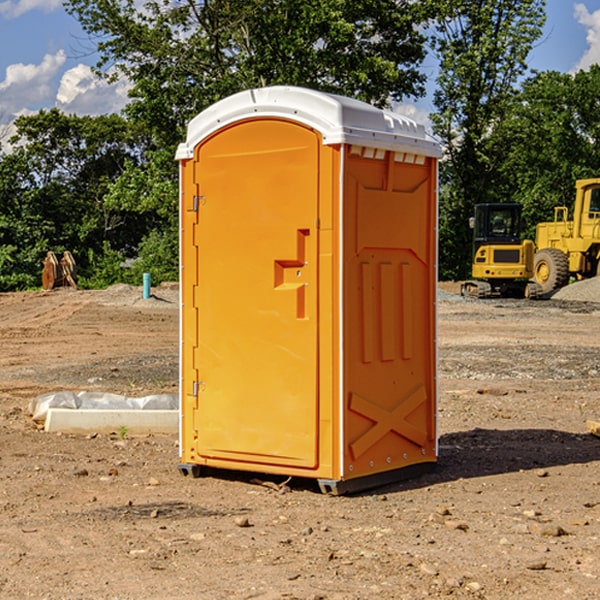 how often are the portable restrooms cleaned and serviced during a rental period in Tuscola